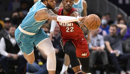  巴特勒三双热火加时险胜尼克斯  